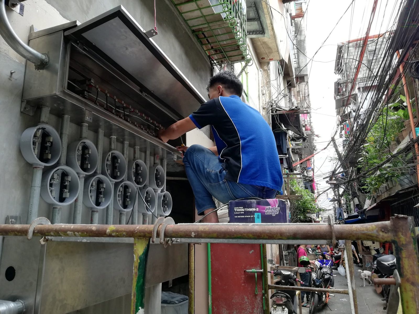 BBD electrician at work installing electrical systems on site